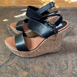 Steve Madden high wedge open toe sandals.